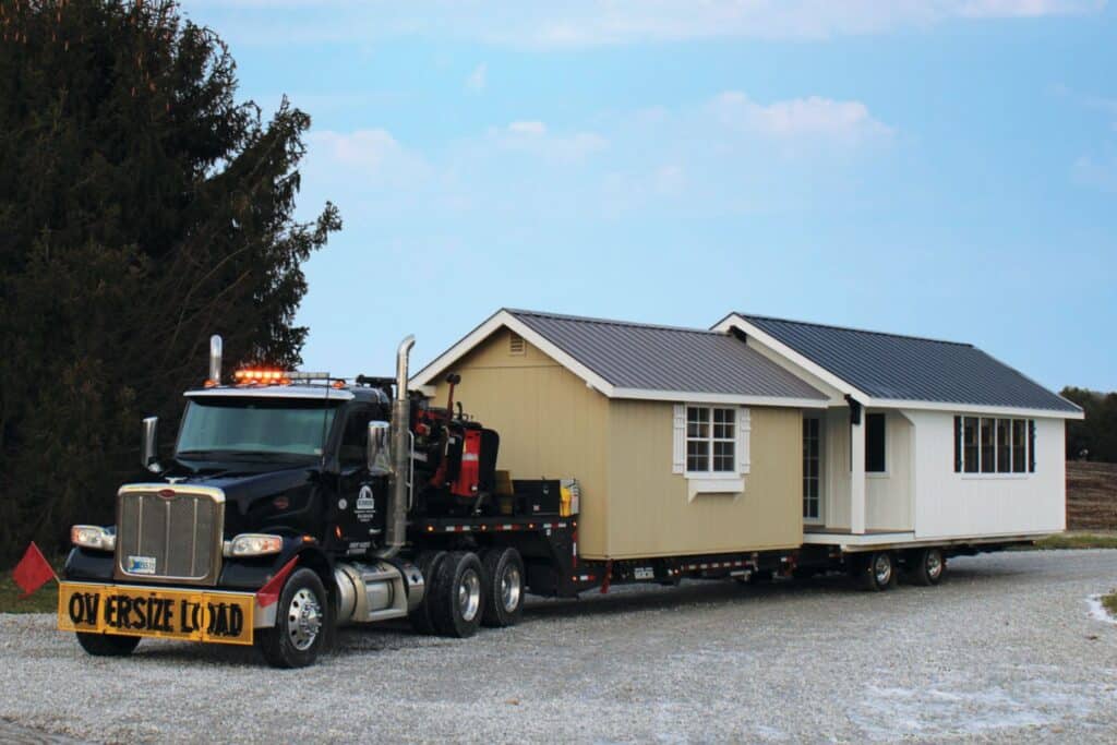 Rent-to-own Sheds in Indiana, White and Brown shed on back of truck