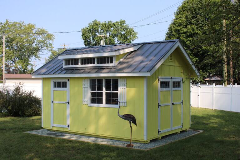 Side of yellow outdoor shed