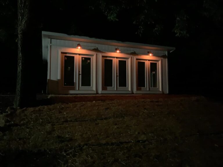 Backyard office doors at night