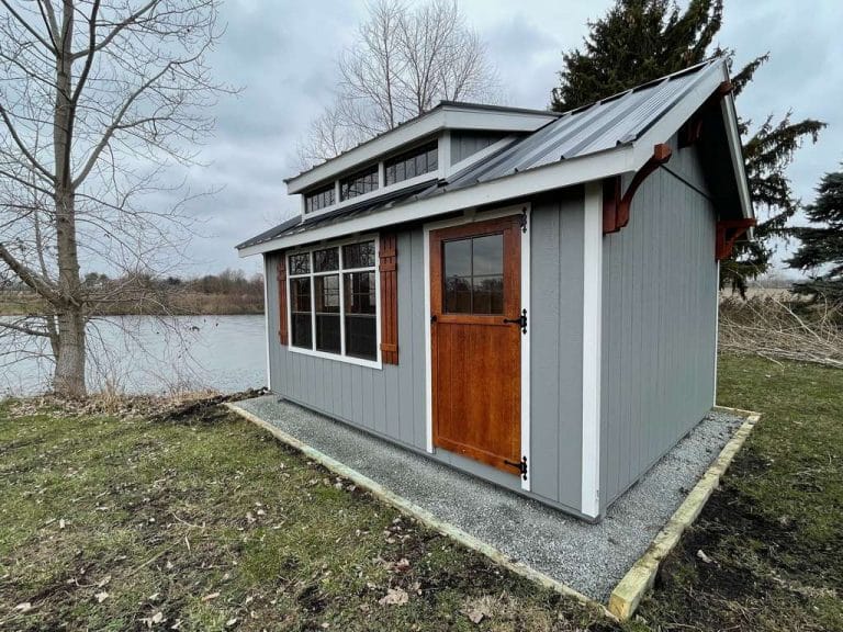 Shed in back yard by pond