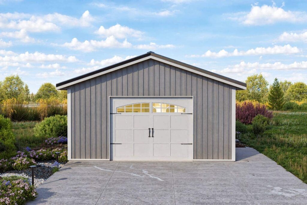 Grey one-car value series garage with white garage door on driveway